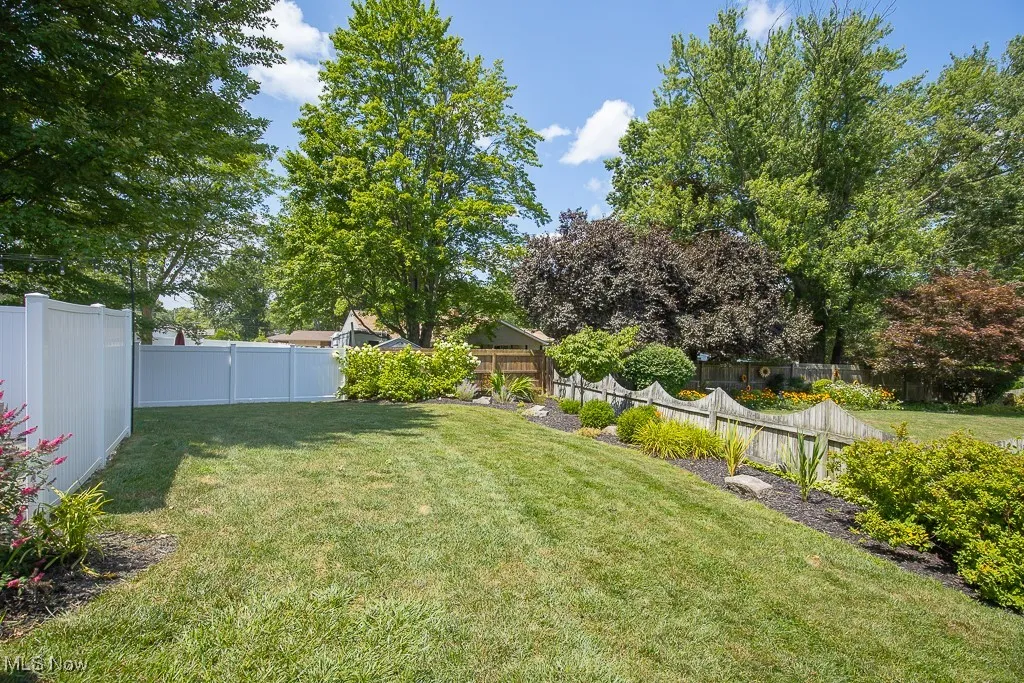 View of fenced backyard