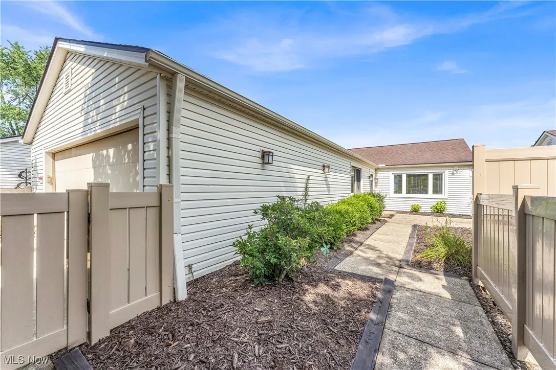 View of home's exterior with a garage
