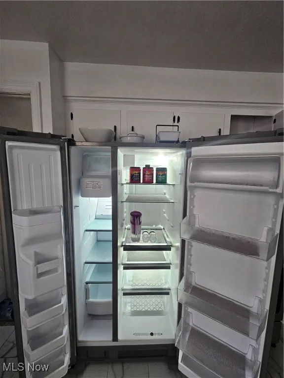 Kitchen view of white cabinetry