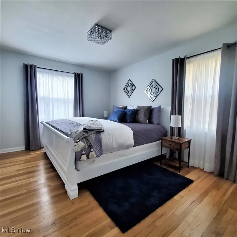 Bedroom with light wood-style flooring