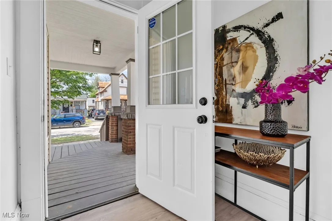 Doorway to outside with wood finished floors