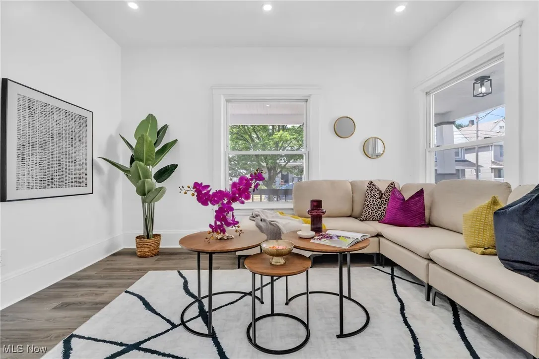 Living room featuring plenty of natural light, recessed lighting, and wood finished floors