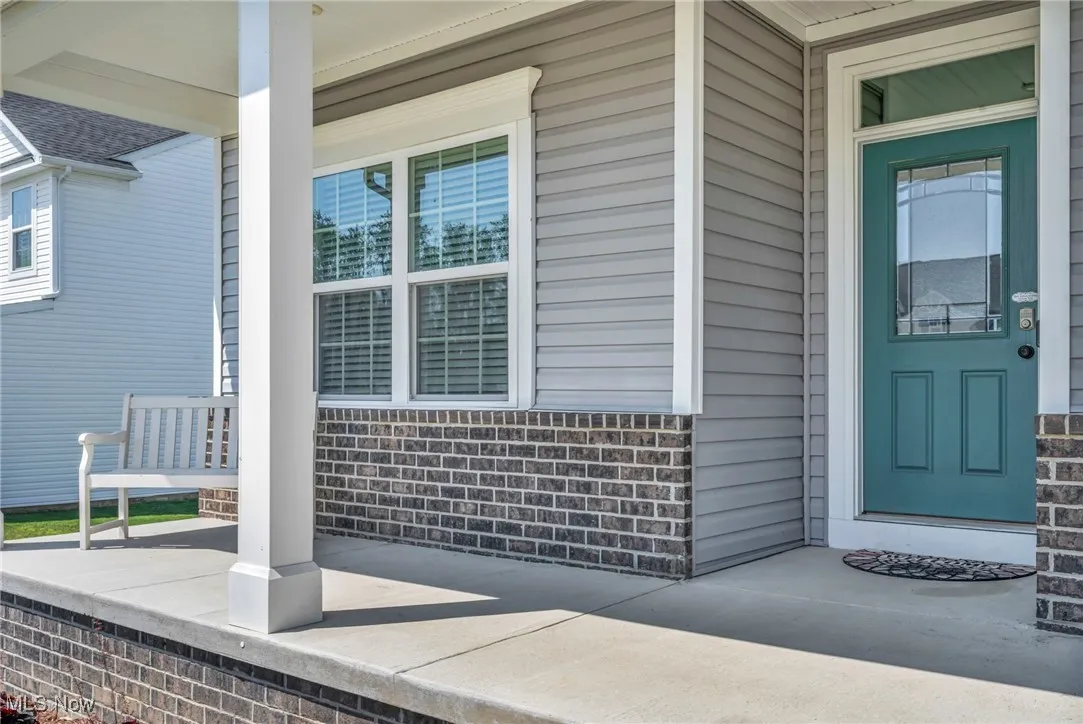 Doorway to property with a porch