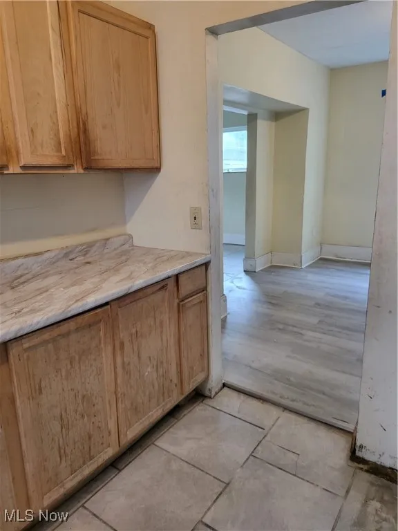 Kitchen featuring light countertops and light tile patterned floors
