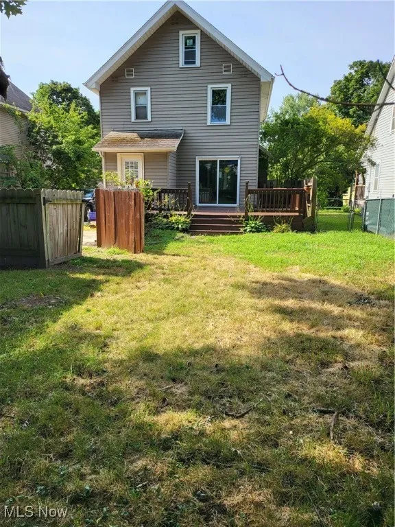 Rear view of house with a deck