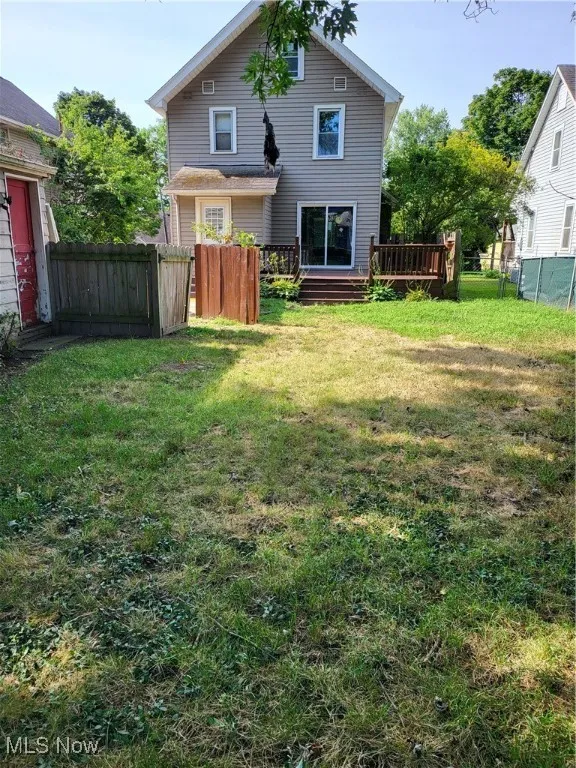 Rear view of house with a deck