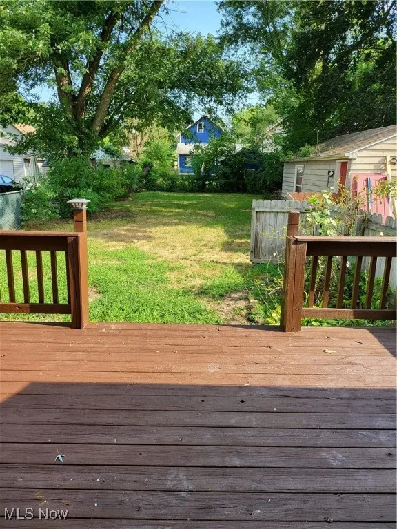 Wooden terrace with a yard