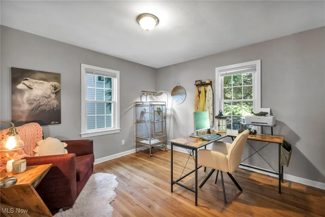 First floor office space or bedroom with original hardwood flooring and 2 windows for lots of natural light.