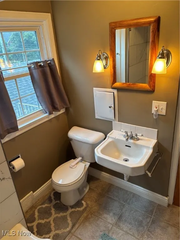 Bathroom with baseboards