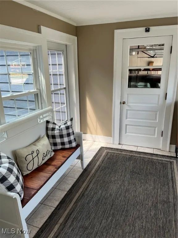 Side door entry into breezeway for house, garage and rear yard.