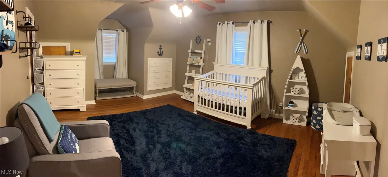 Bedroom with wood finished floors