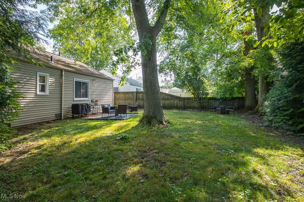 View of yard with a patio