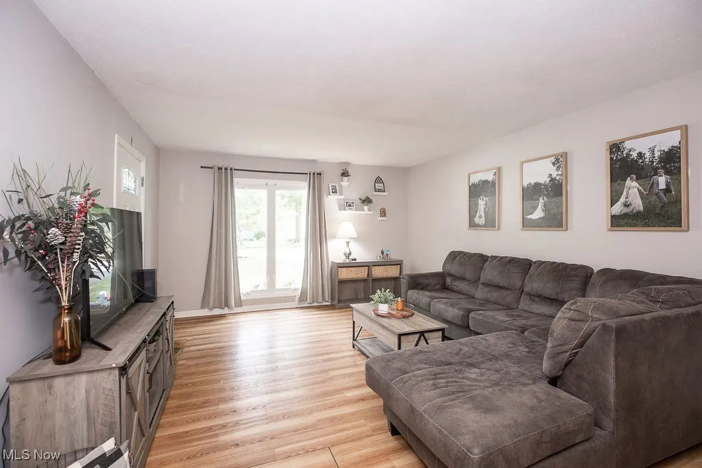 Living area featuring light wood-style floors