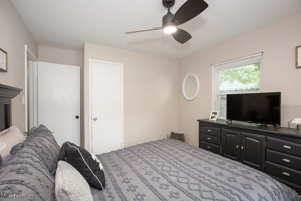 Bedroom featuring a ceiling fan