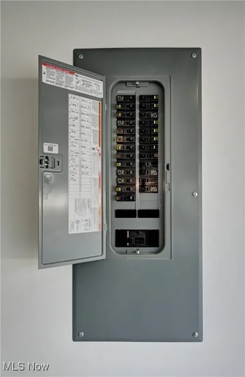 Utility room featuring electric panel