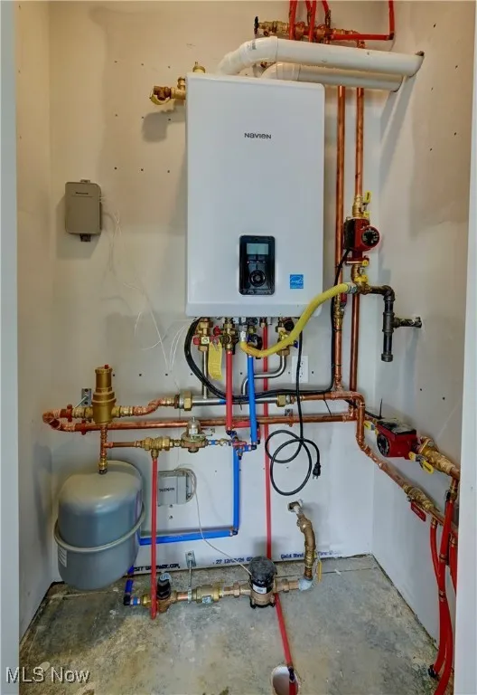 Utilities featuring tankless water heater