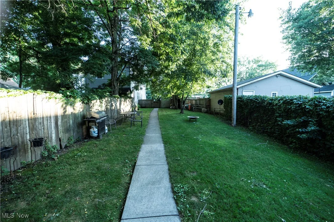 View of fenced backyard