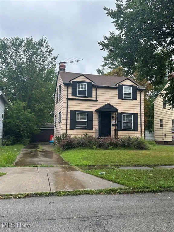 Front with 2 car garage