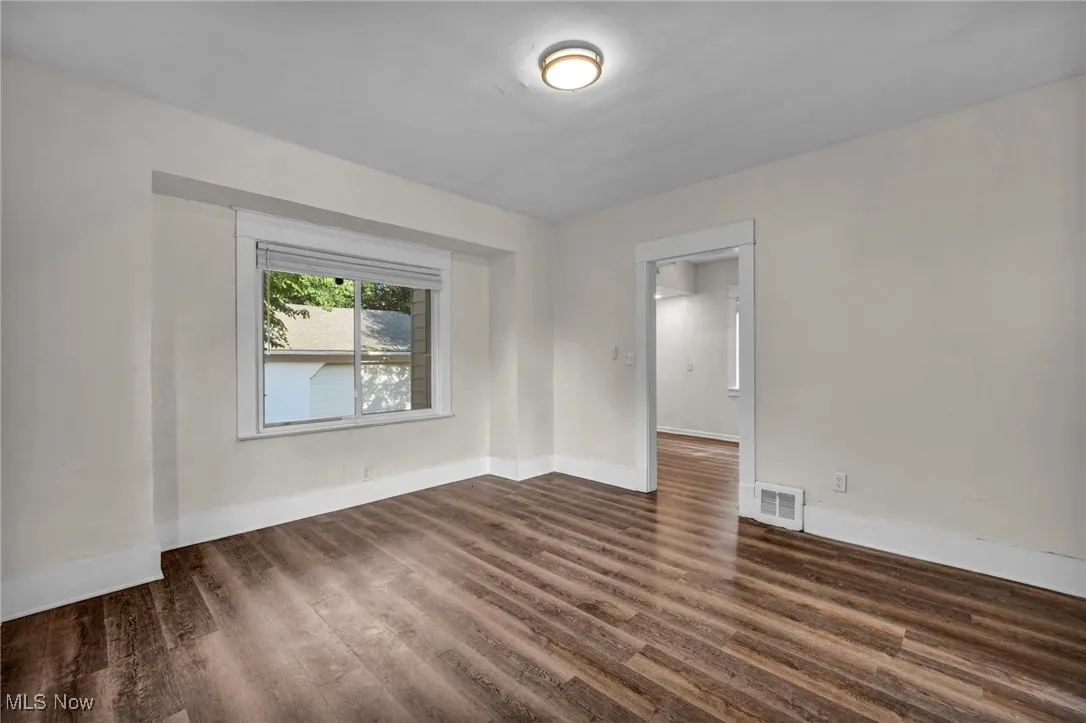 Dining room featuring wood finished floors and natural lighting