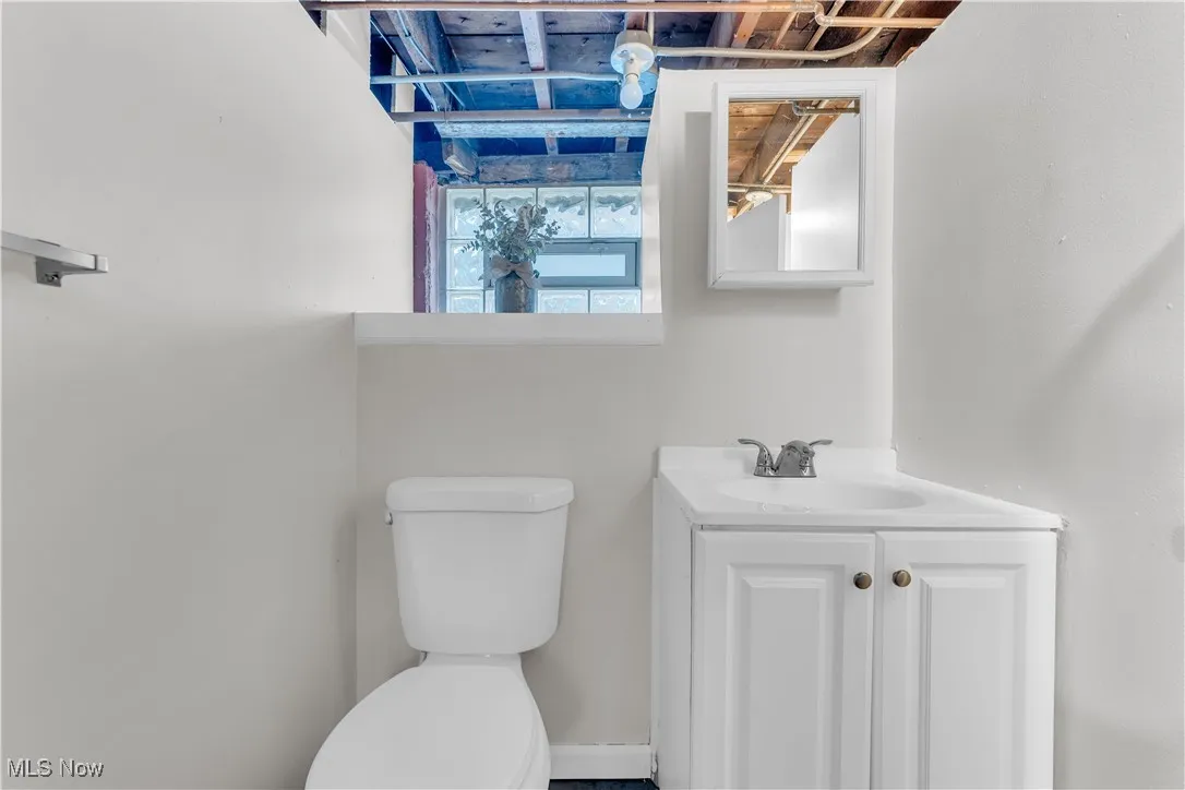 Bathroom featuring toilet and vanity