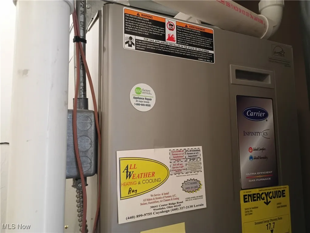 Utility room featuring Carrier furnace