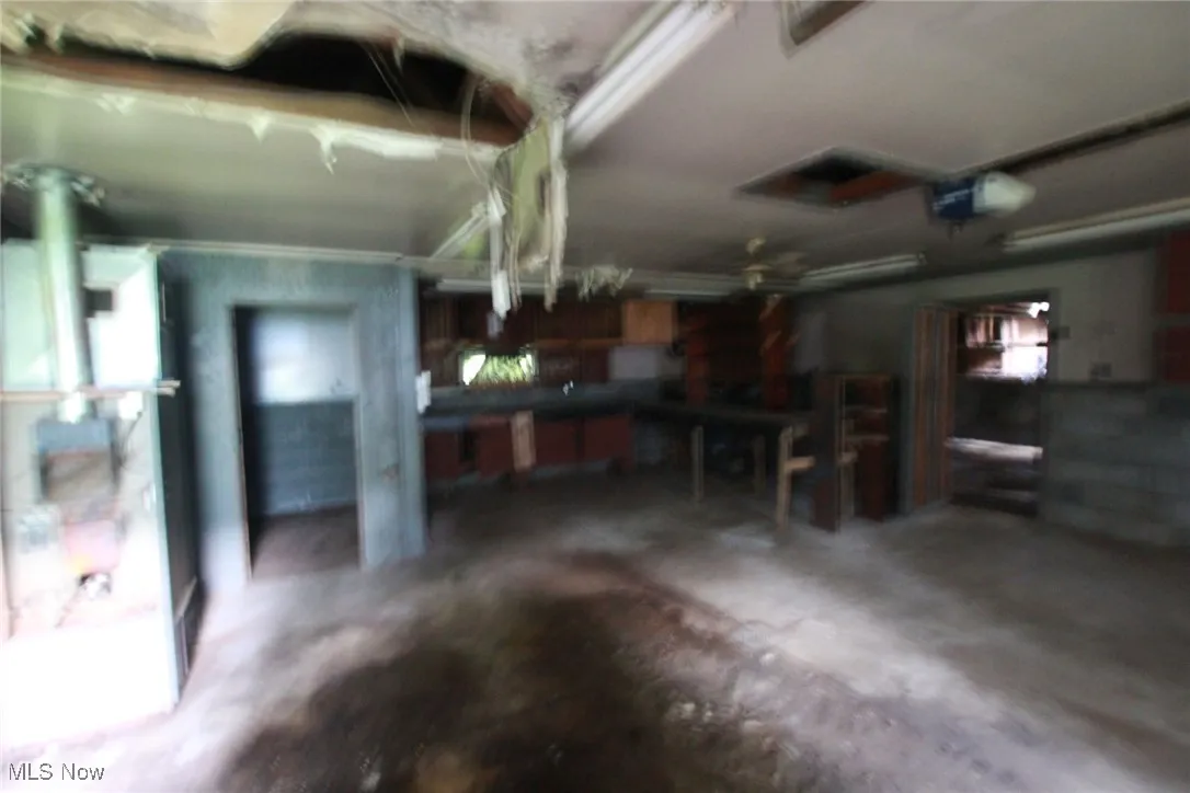 Garage featuring a garage door opener