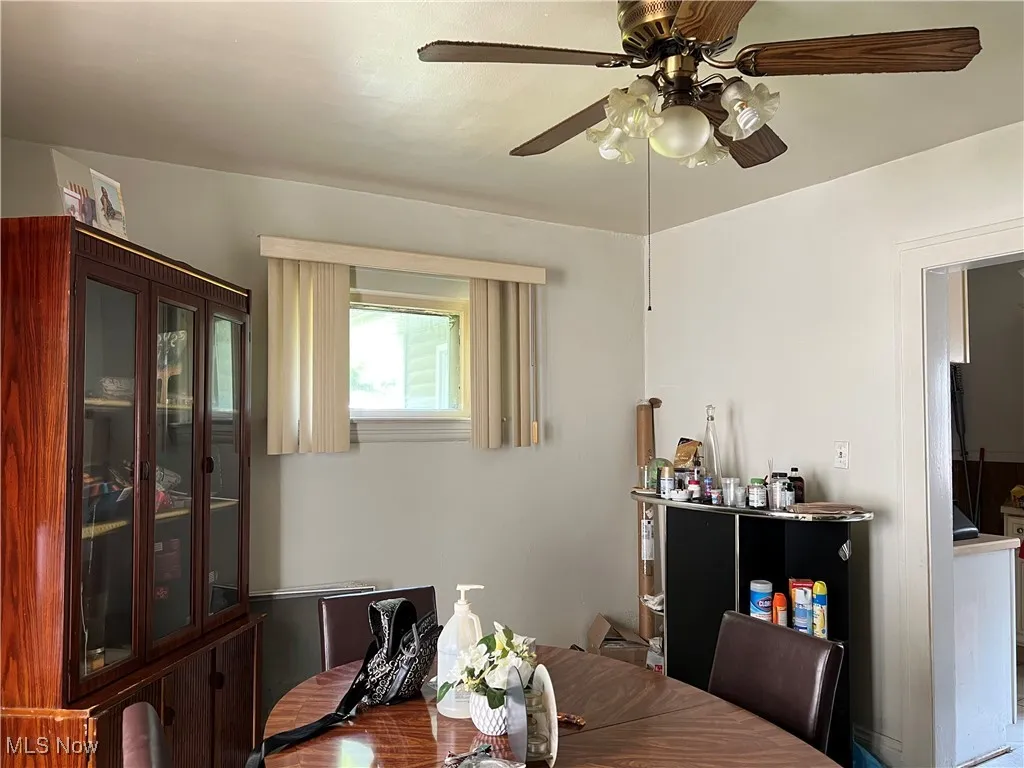 Dining space featuring a ceiling fan