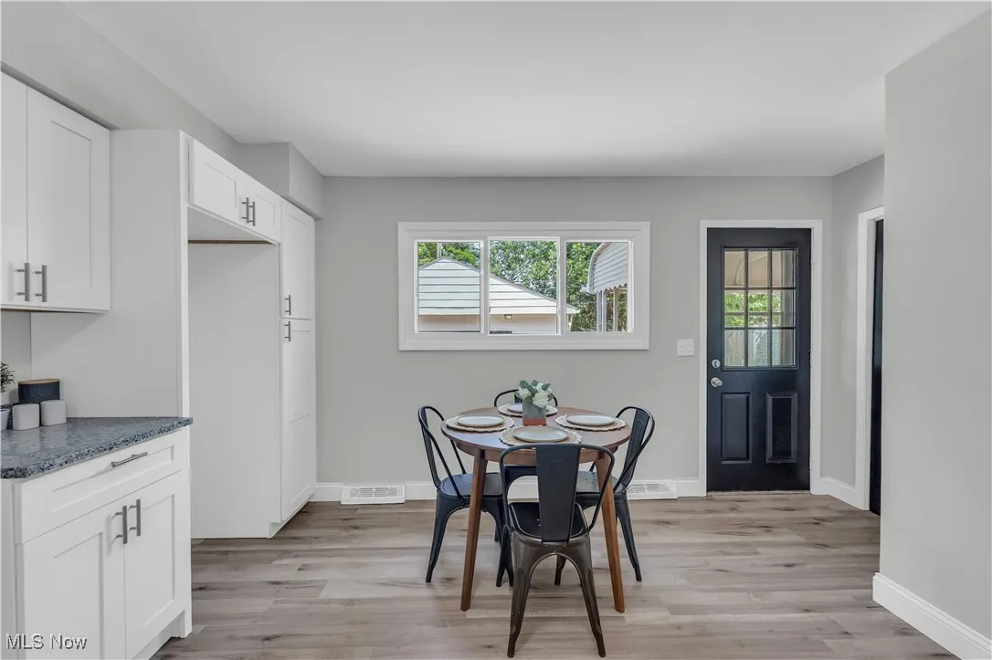 Dining room with light wood-type flooring