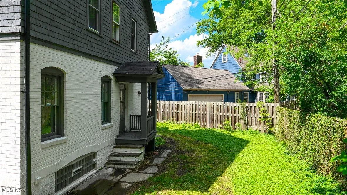 View of yard featuring a garage