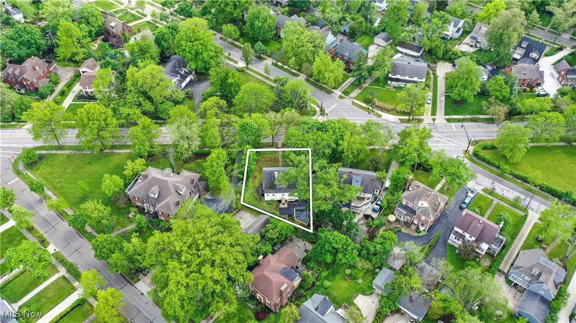 Aerial perspective of suburban area with property parcel outlined