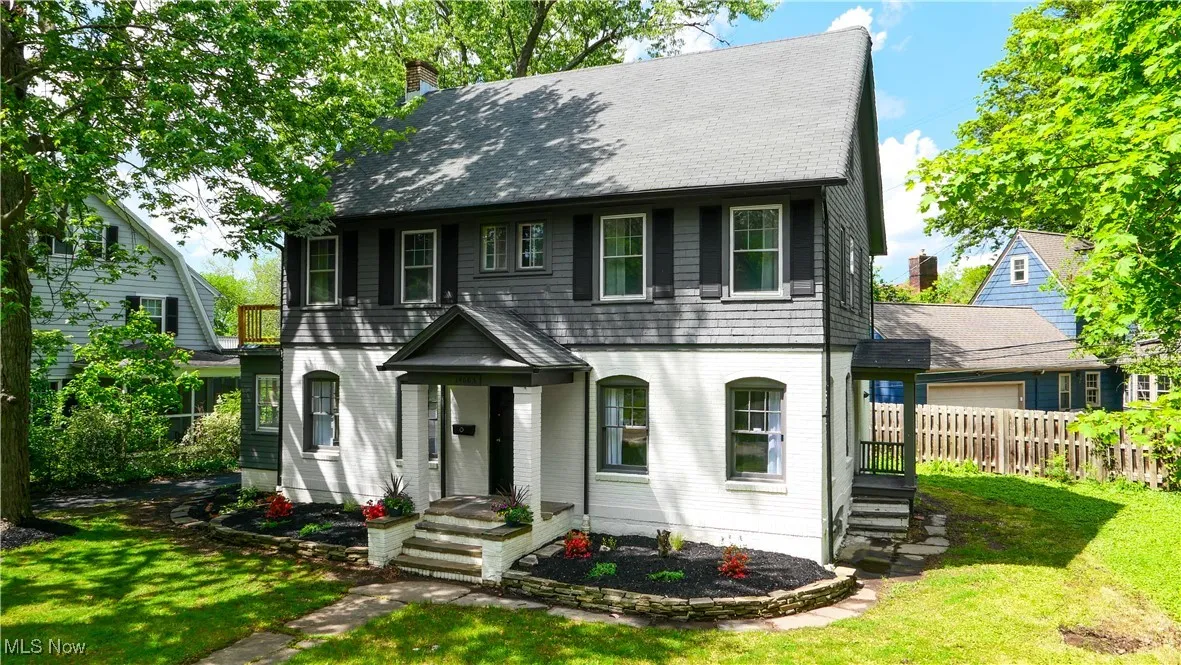 View of front of home with a chimney