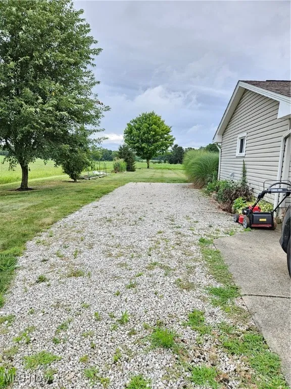 View featuring gravel driveway for RV parking