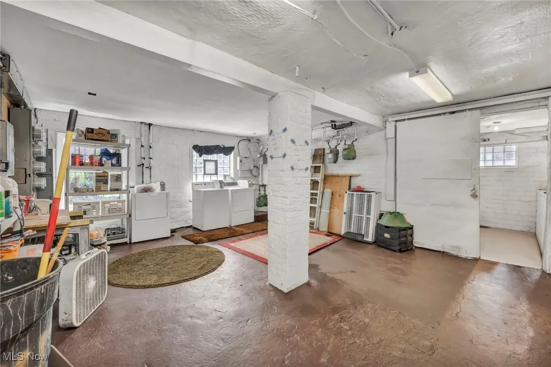 Basement featuring washer and dryer