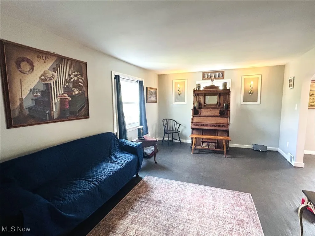 Living area featuring arched walkways