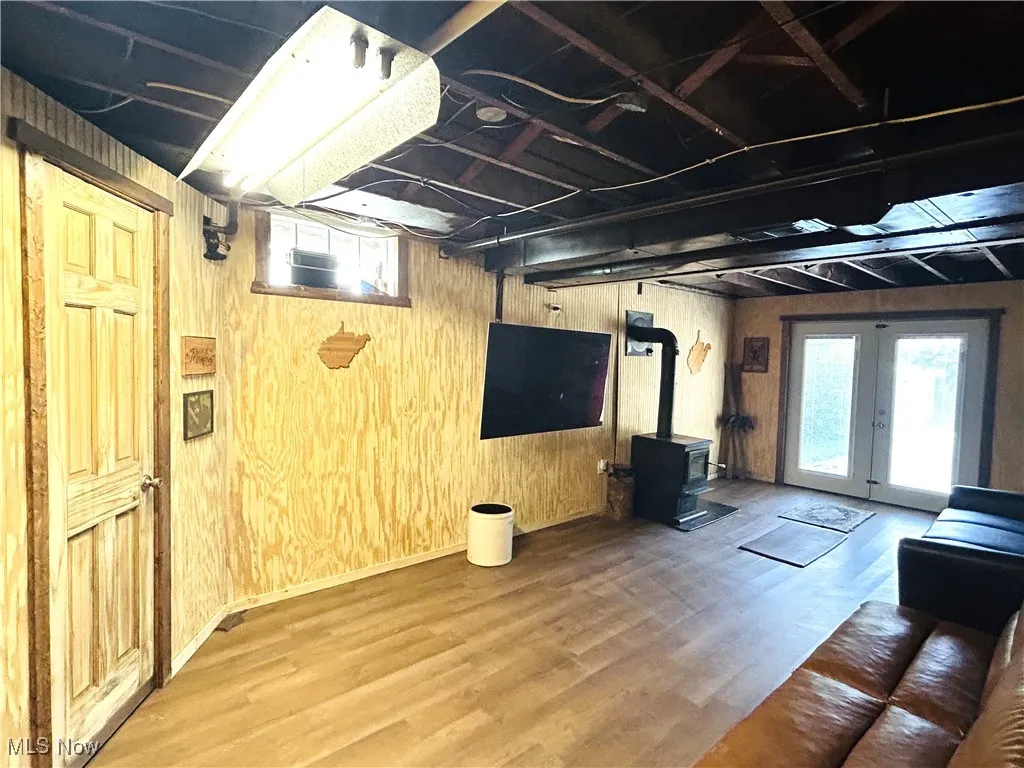 Recreation room featuring a wood stove