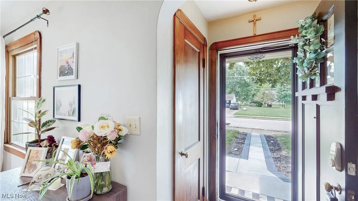 Entryway featuring arched walkways
