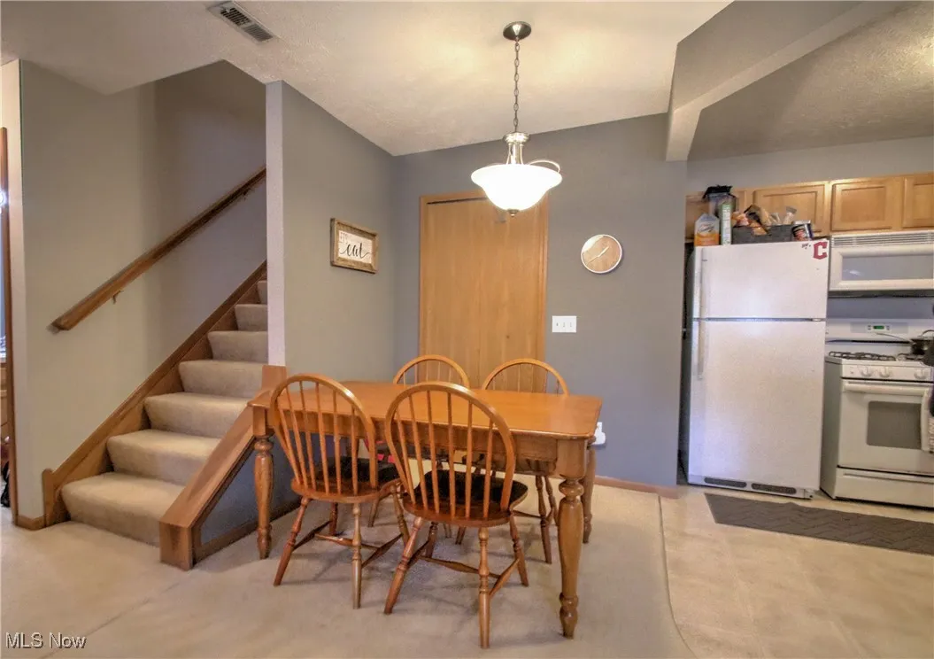 Dining space with stairs