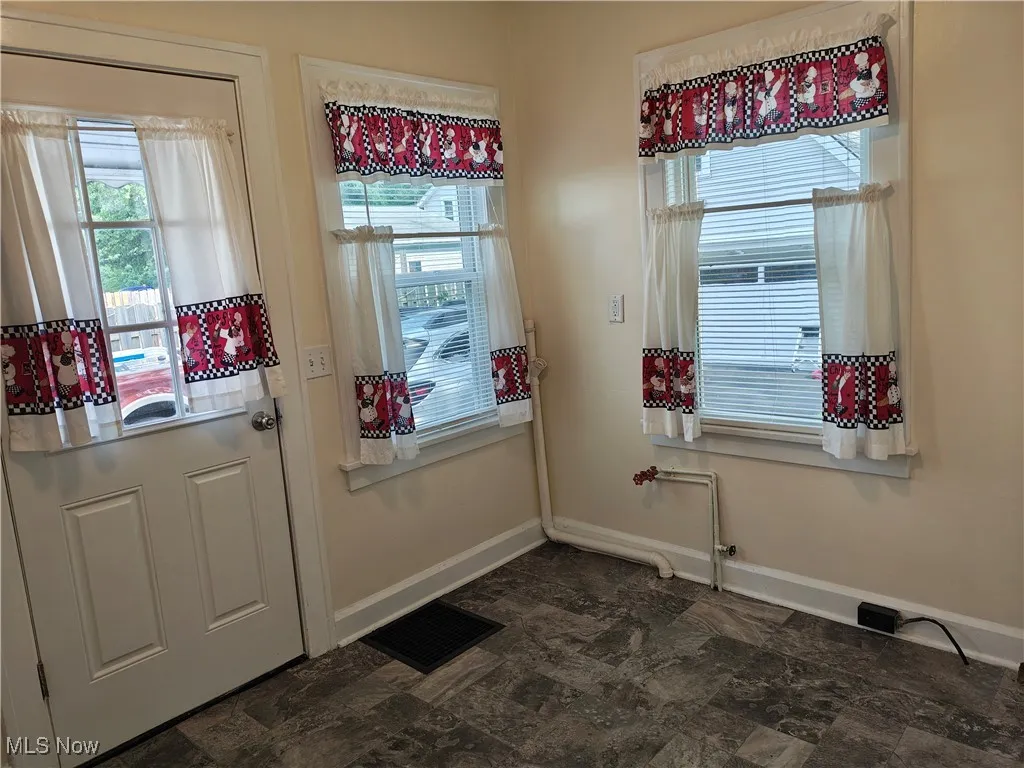 Entryway featuring baseboards