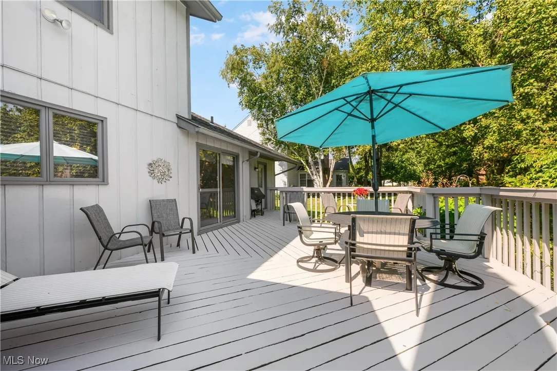Wooden deck with outdoor dining space