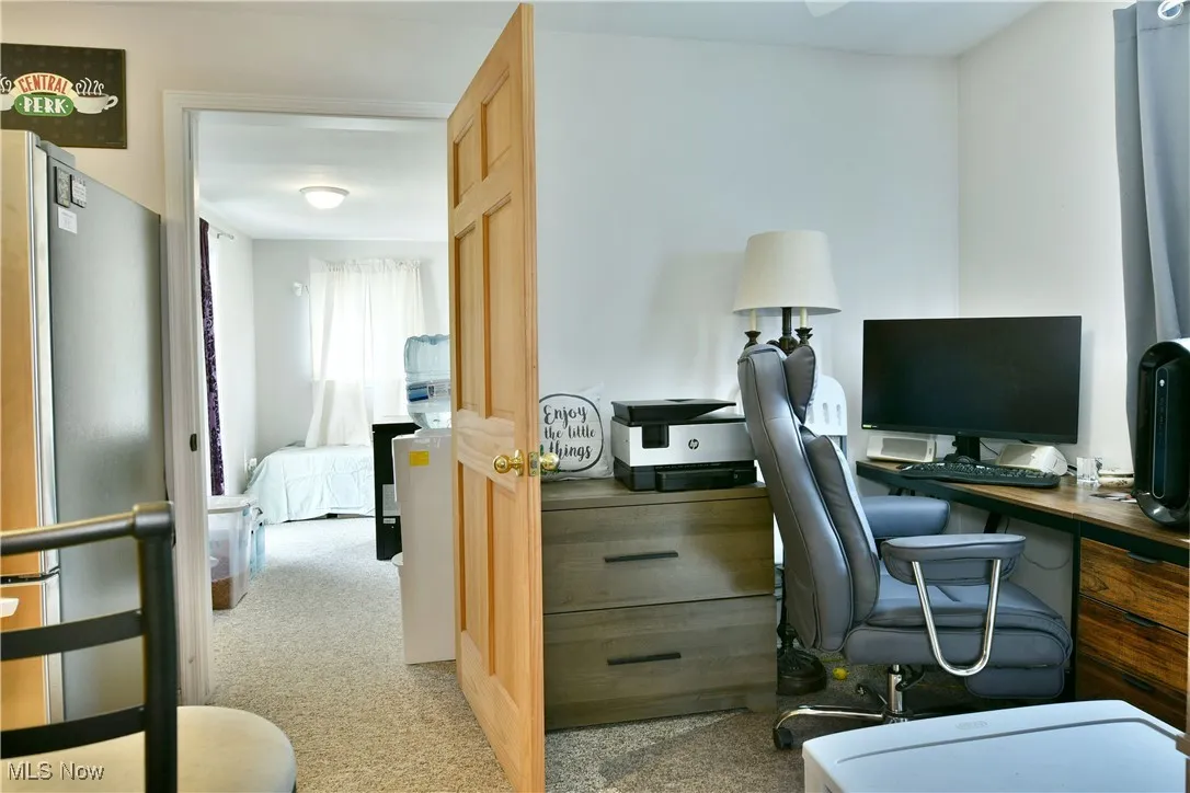 Office area with light colored carpet