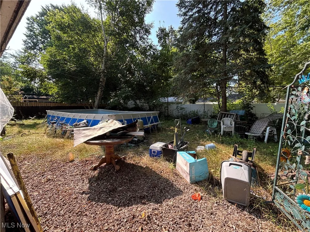 View of fenced backyard