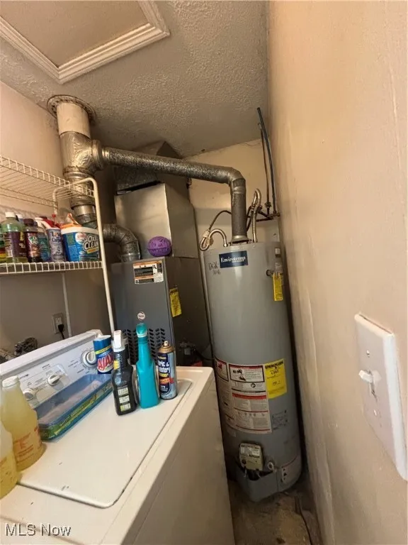 Utilities featuring washer / dryer and water heater