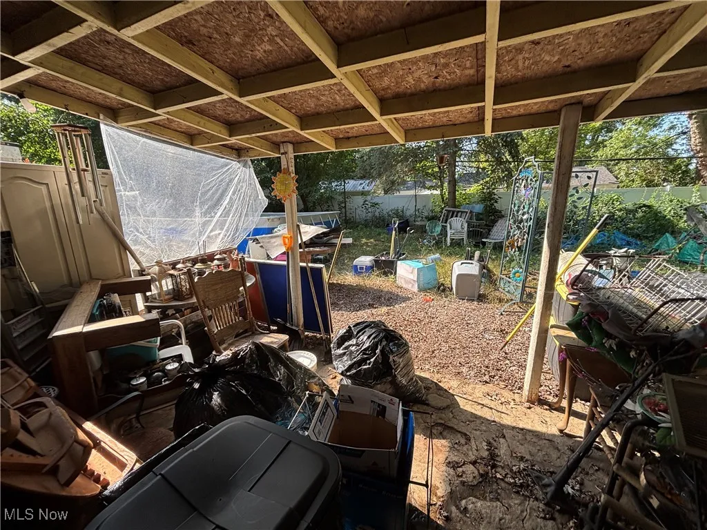 View of fenced backyard