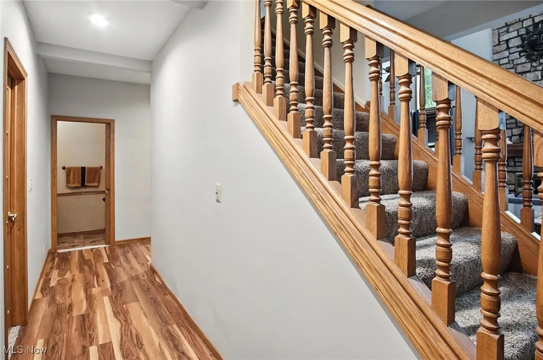 Hallway to bedrooms and 1/2 bath