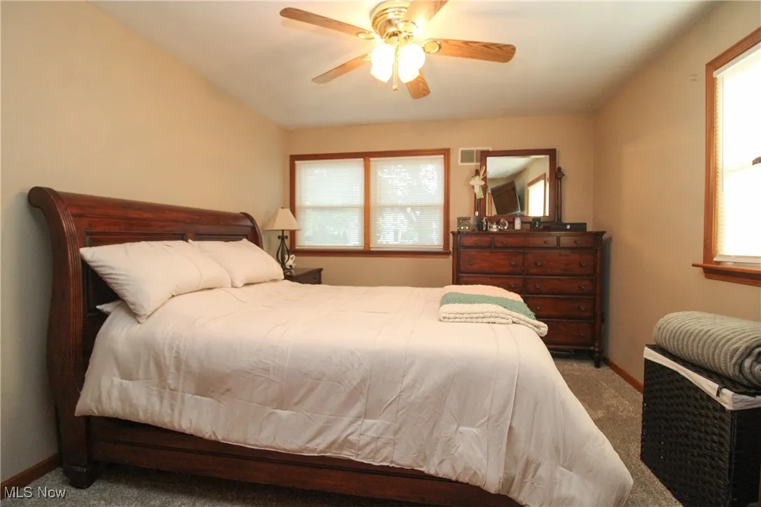 Bedroom featuring carpet floors and a ceiling fan