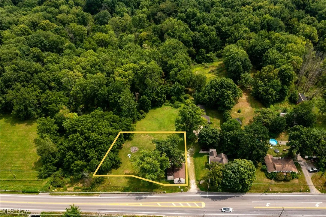 Aerial view of property's location featuring property parcel outlined