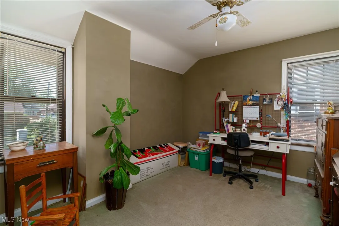 This upstairs bedroom now being used as an office with walk in closet