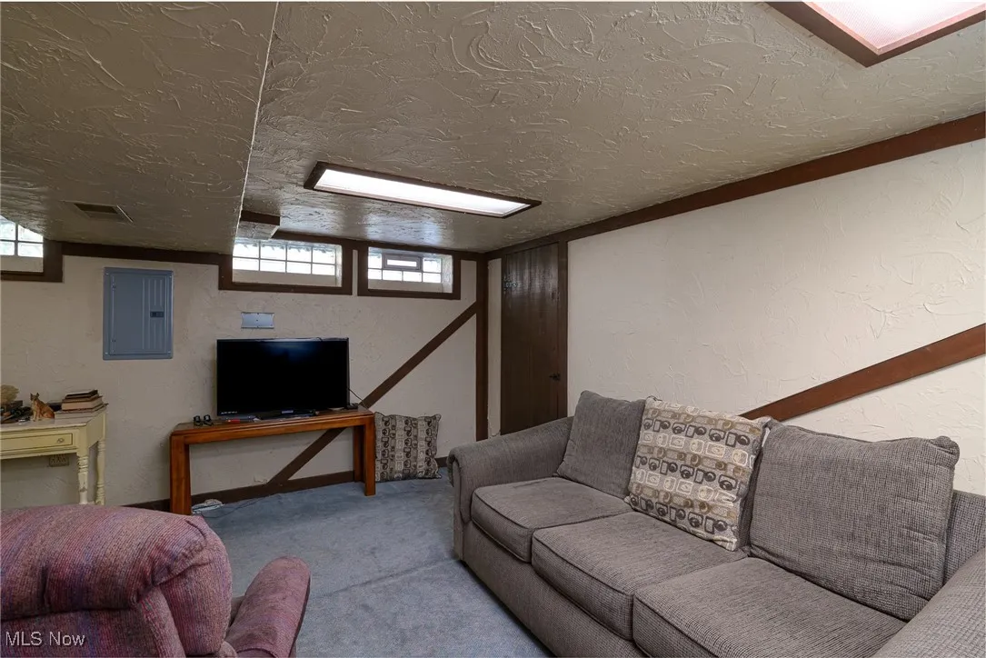Cozy rec room with glass block windows
