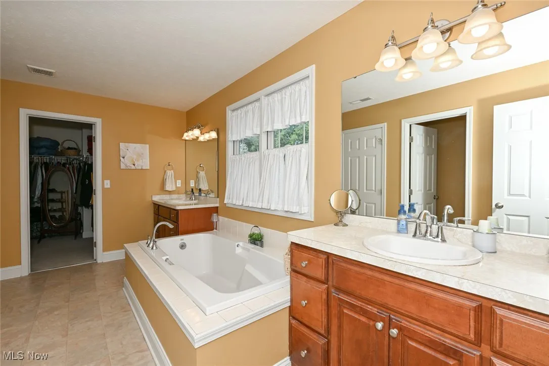 Master Bath has double sinks, soaking tub, separate shower & walk-in closet