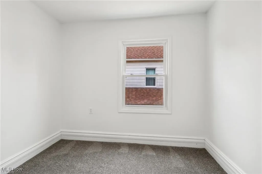 Bedroom featuring carpet